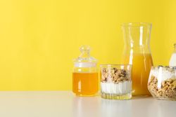 Tasty and nutritious breakfast concept - muesli with yogurt