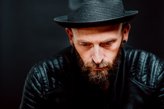 Young bearded guy in leather jacket