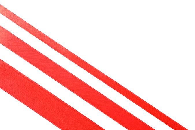 Red ribbons isolated on blank background. Gift concept
