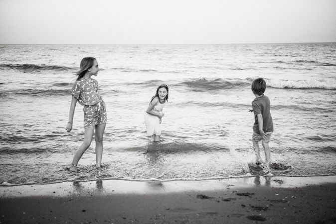 Kids playing in shallow water