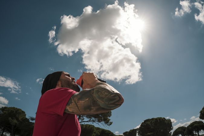 Man drinking during training