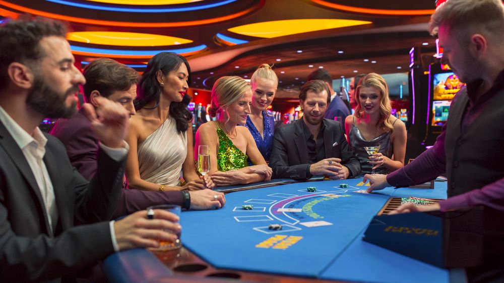 Patrons Having Good time Luxury Evening on Casino Floor, Placing Betts, Socializing.