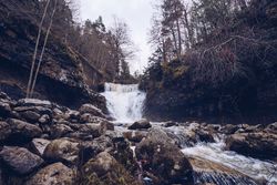 Cascade mountain river at autumn forest