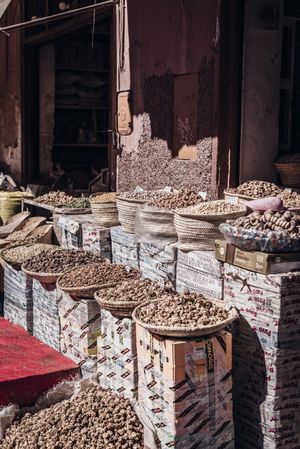 Baskets with dried spices on marketplace