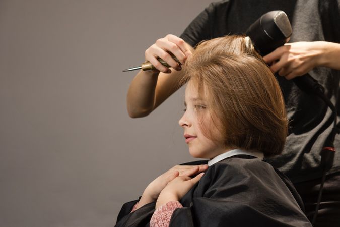 Child Modeling a Bob Haircut