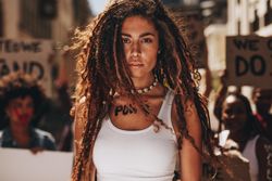 Woman with word power written on her bod