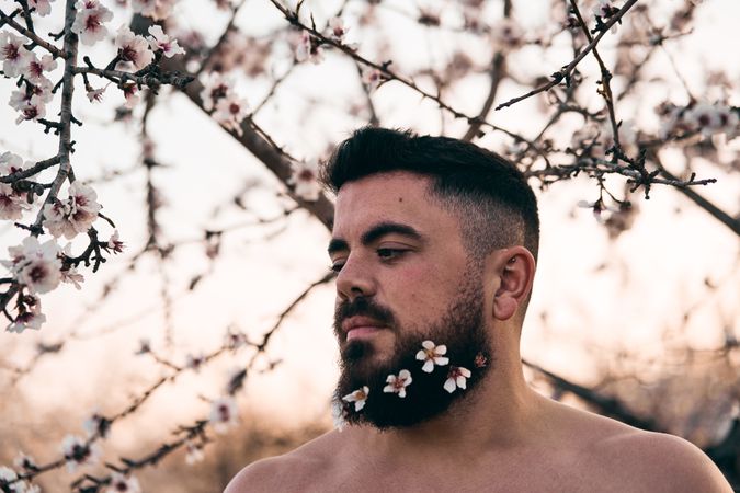 Man with flowers in beard