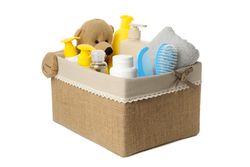 Baby hygiene accessories isolated on light background