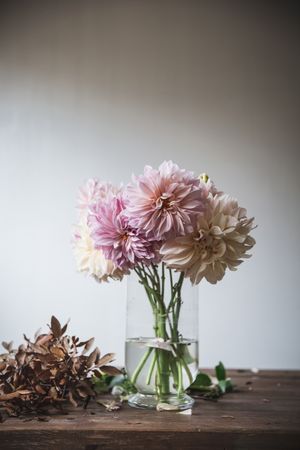 Bunch of flowers in vase on table