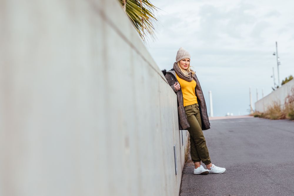Portrait of blonde woman posing in the city