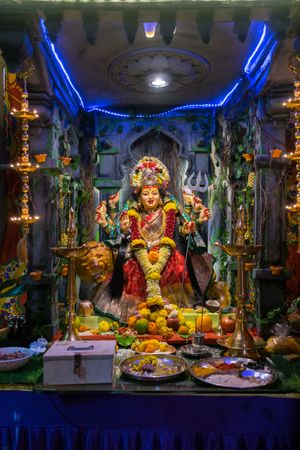 A beautiful idol of Maa Durga being worshipped at a pandal during Navratri in Mumbai, India