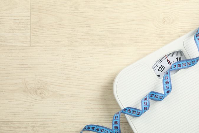 Scales and measuring tape. Weight loss concept