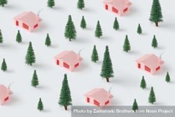 Christmas pattern made with pink houses and pine trees 0VgJ35
