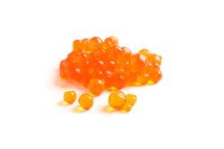 Red caviar isolated on blank background, closeup