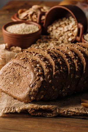 Freshly baked rye bread on napkin on table