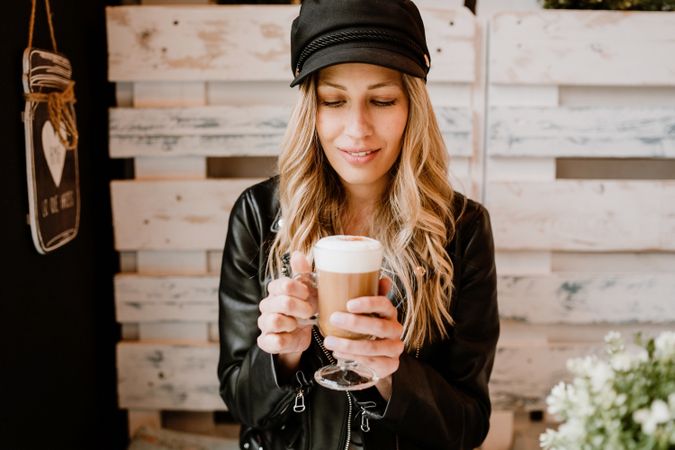 Woman holding coffee in hands