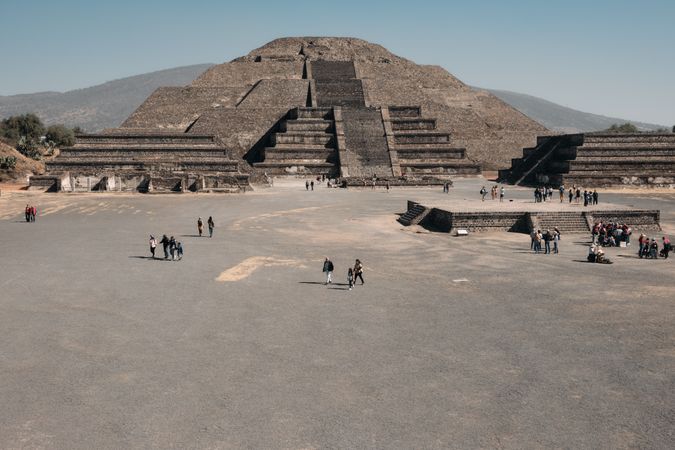 Visitors exploring ancient pyramids in Teotihuacan Valley