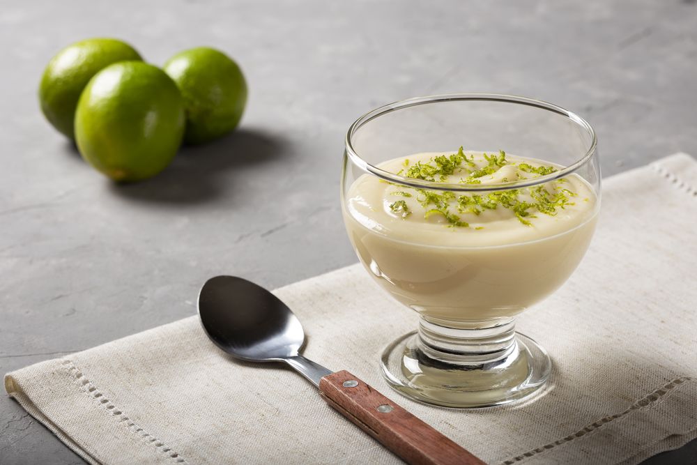 Lemon mousse with lemon zest on top.