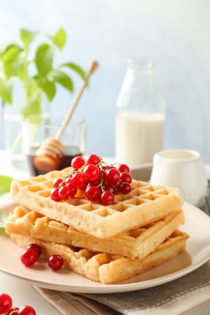 Beautiful composition with sweet belgian waffles, space for text