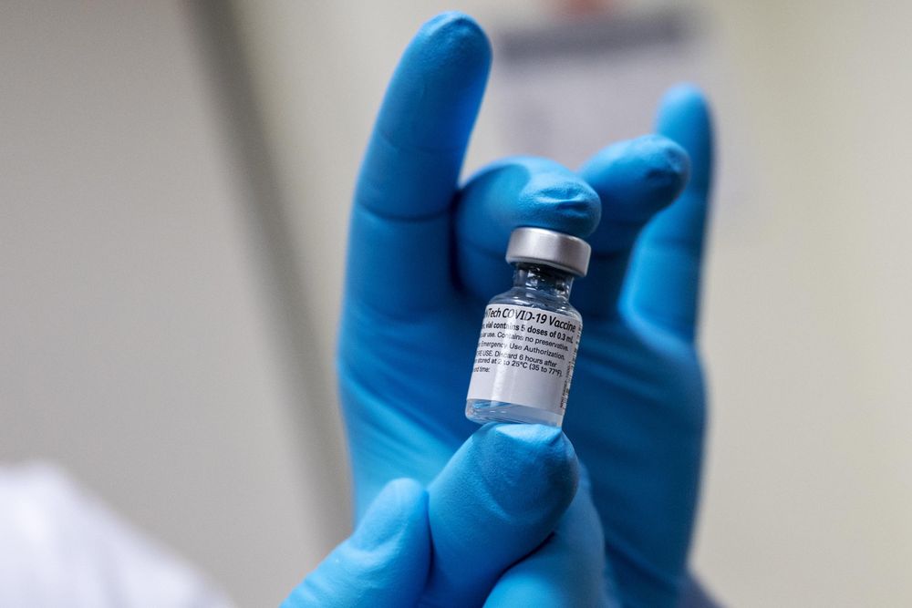Close up of a vial of COVID vaccine