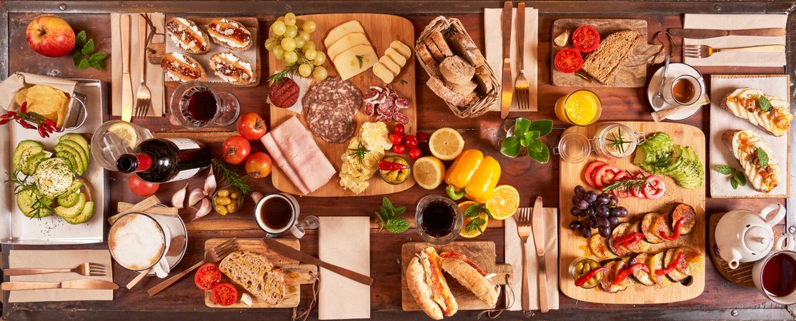Assorted appetizers on wooden table