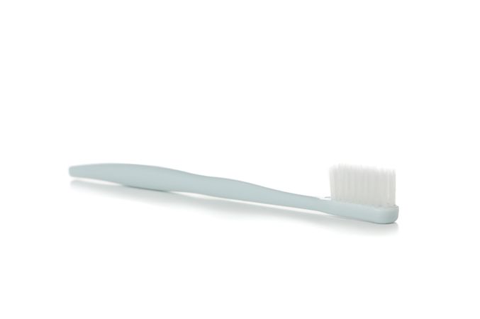 Toothbrush isolated on light background. Dental care
