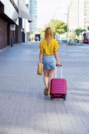 Young woman traveler going on holiday