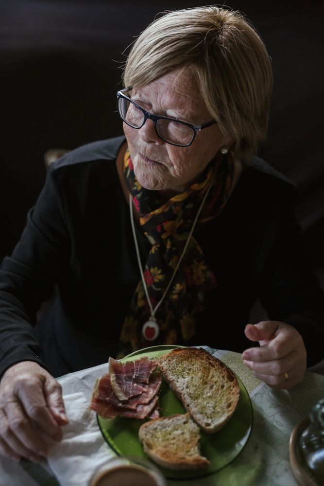 Older woman having breakfast