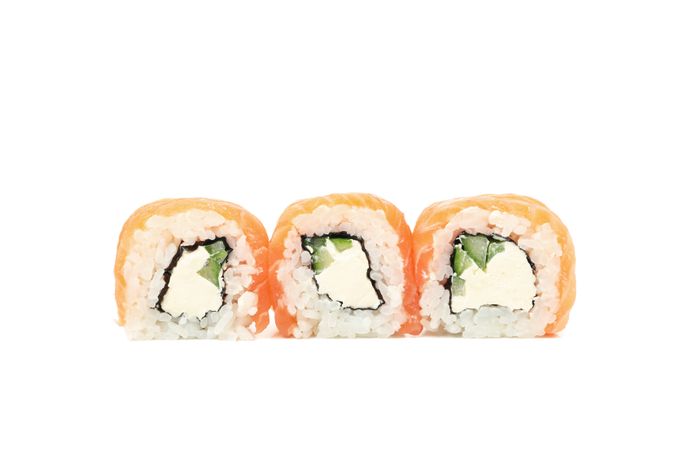 Japanese food. Delicious sushi rolls isolated on light background