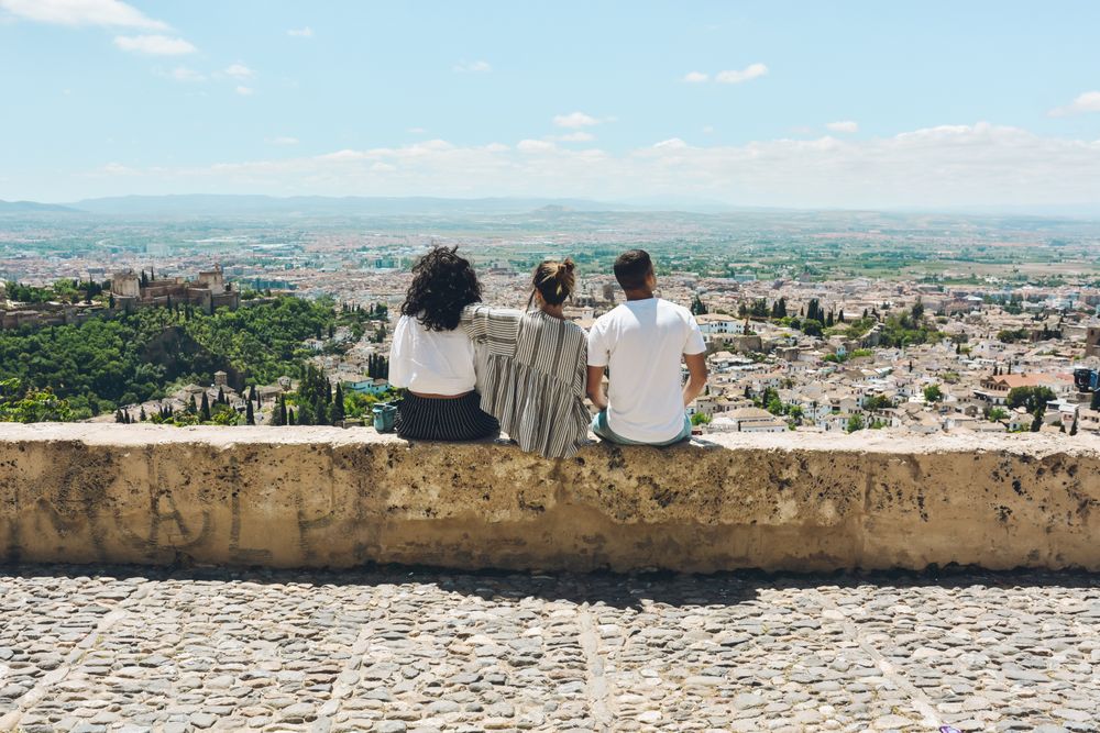 Group of friends doing tourism in Spain.