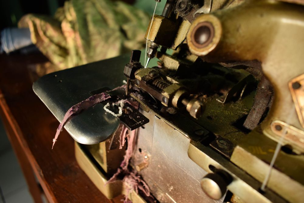 Close up of strip of fabric in sewing machine