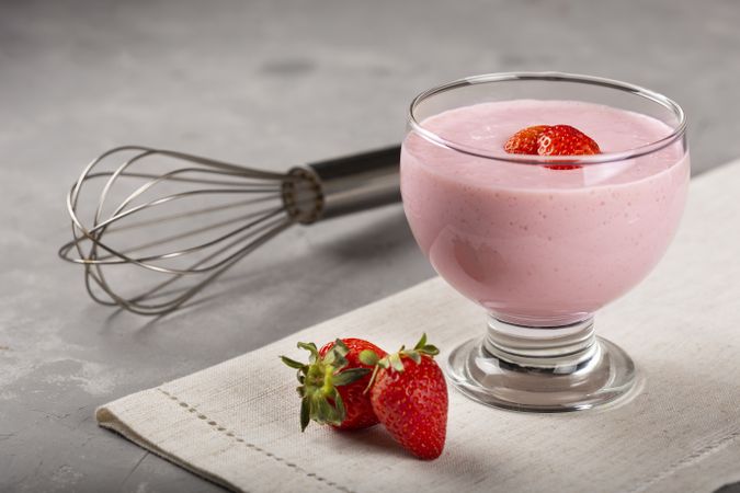 Delicious strawberry mousse in glass goblet.