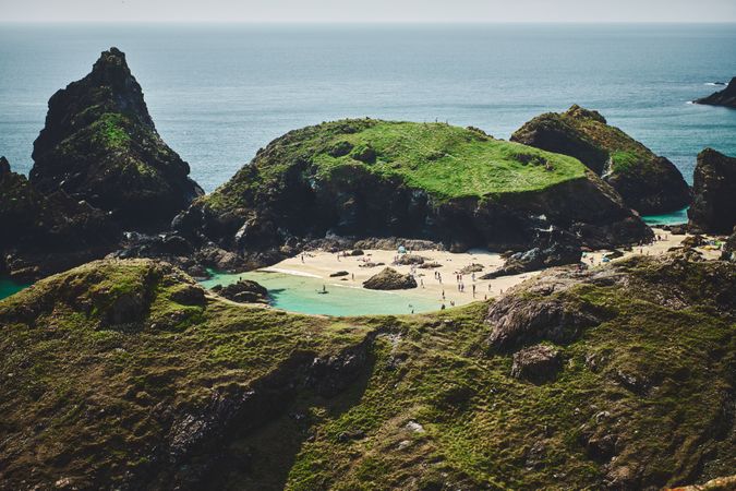 Beach nestled in the cliffs in Cornwall