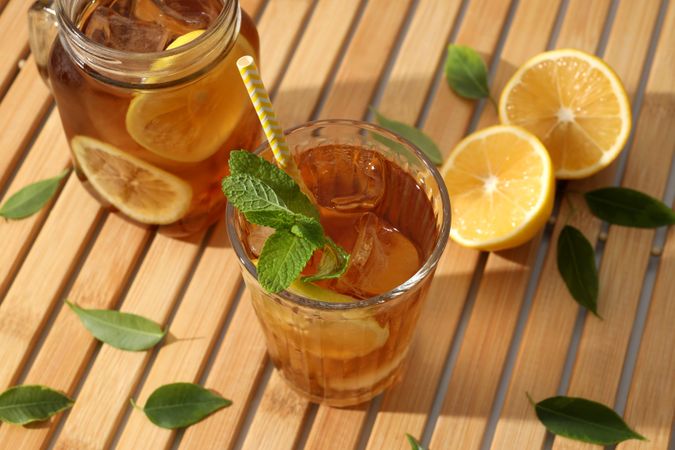 Cold tea with fresh oranges and mint leaves