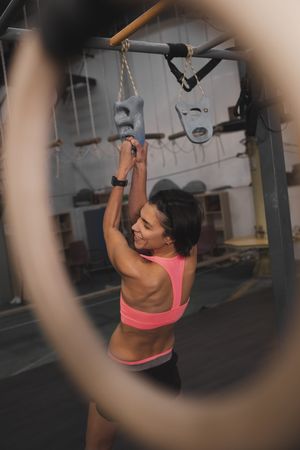 Athletic woman training in gym