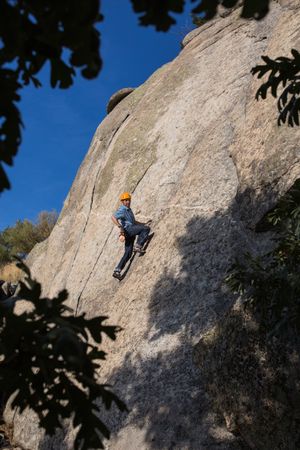 Free climber climbing in nature