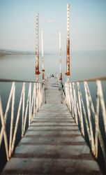 Rusty pier near calm sea