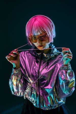 Woman standing in sparkly silver jacket