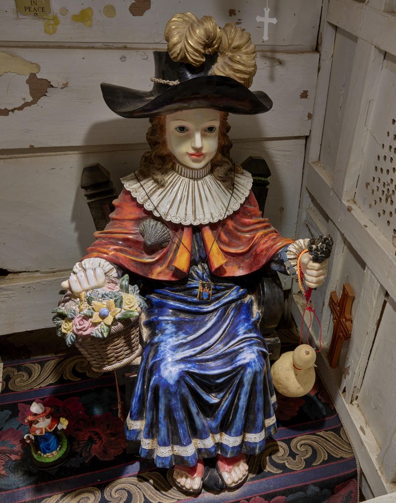 Figure of Santo Niño inside the El Santuario de Chimayó, New Mexico