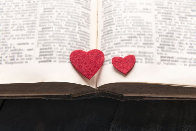 Two hearts on the pages of a book