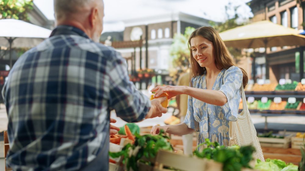 Portrait of a Young Customer Shopping for Organic Seasonal Fruits and Vegetables for a Healthy Breakfast.