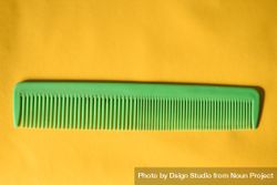 Green hair comb in yellow studio 0v3yQg