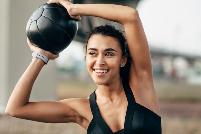 Fit woman working out with ball