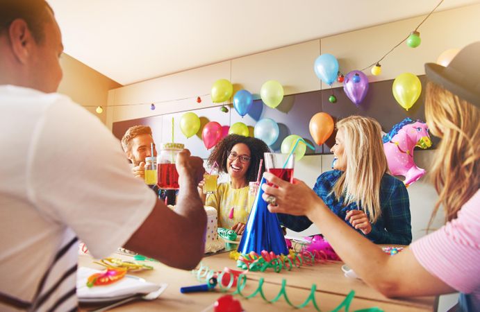 Coworkers laughing during a birthday party