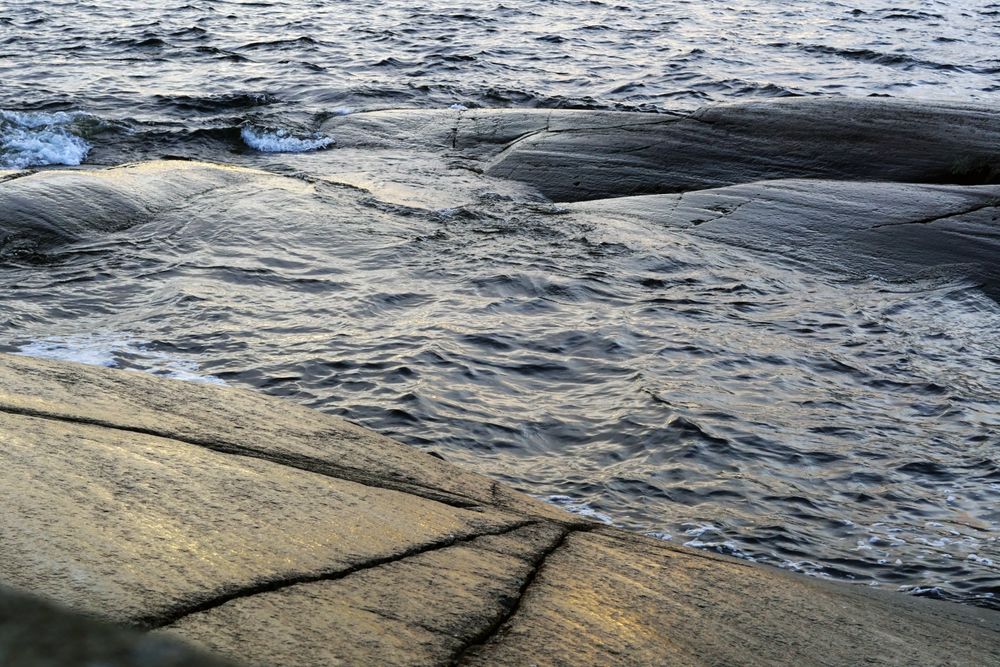 Heavy sea waves at rocky shore