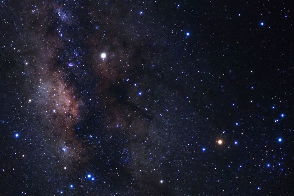 Milky way galaxy with stars and space dust in the universe, Long exposure photograph, with grain.