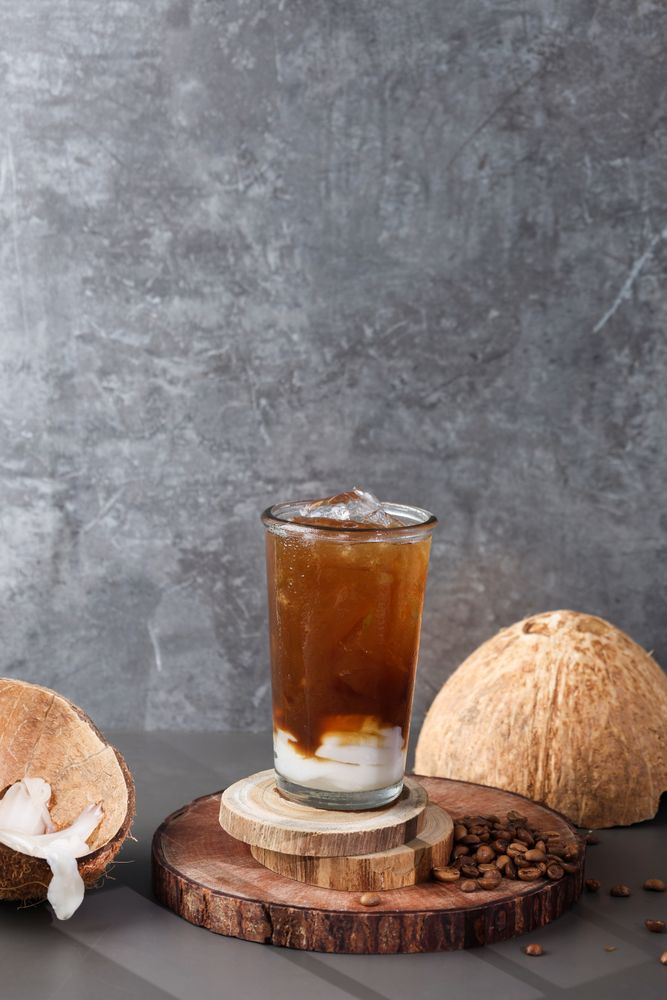 A Glass of Americano with Fresh Coconut Juice and Coconut Flesh, Coconut Espresso Cloud Coffee