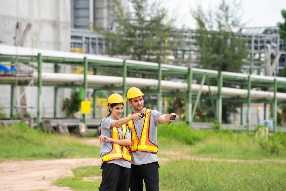 Engineer worker checking project at petrochemical factory or refinery oil plant industrial.
