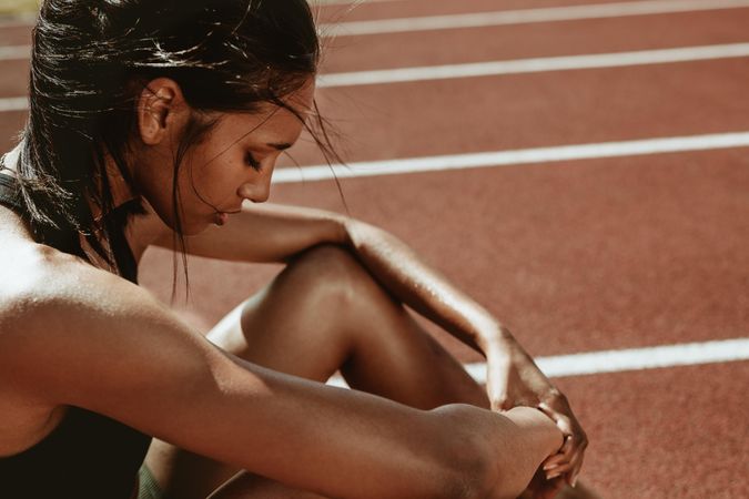 Female runner looking tired after workout session