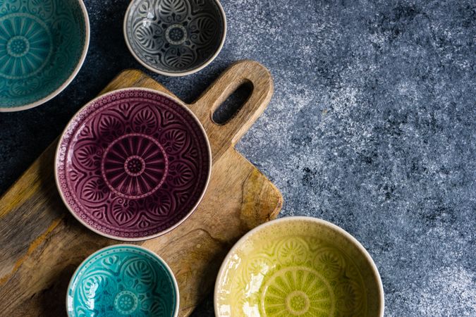 Rustic table setting with patterned bowls with cutting board